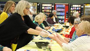 Pine Bush District staff serve dinner to senior citizens