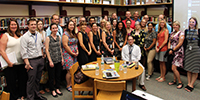 Group of 33 teachers gather in the library