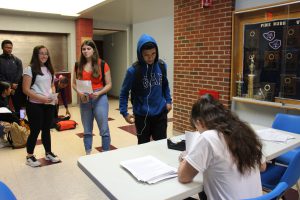 A line forms for students wanting to sign up to give blood.