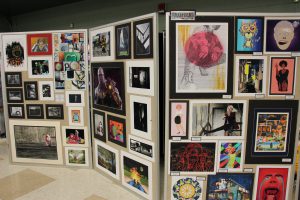 a wall of different art projects