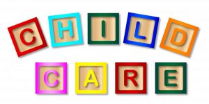 Children's colorful blocks spell out Child Care