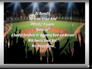 A baseball field with fans standing with their arms up with the text EJ Russell's 5th Grade Virtual Band Proudly Presents BAtter Up A symphony for beginning band and narrrator wth special guest Mrs. Halsey-Sproul
