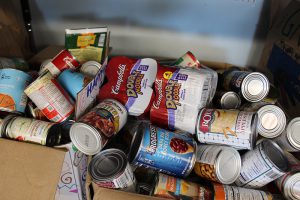 a big box of cans, all different items.