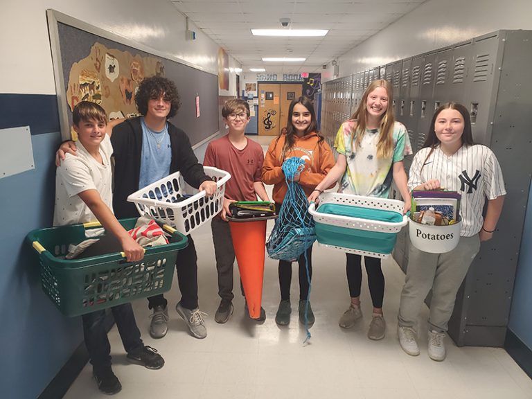 Students have fun with 'Anything But A Backpack' day at Crispell Pine