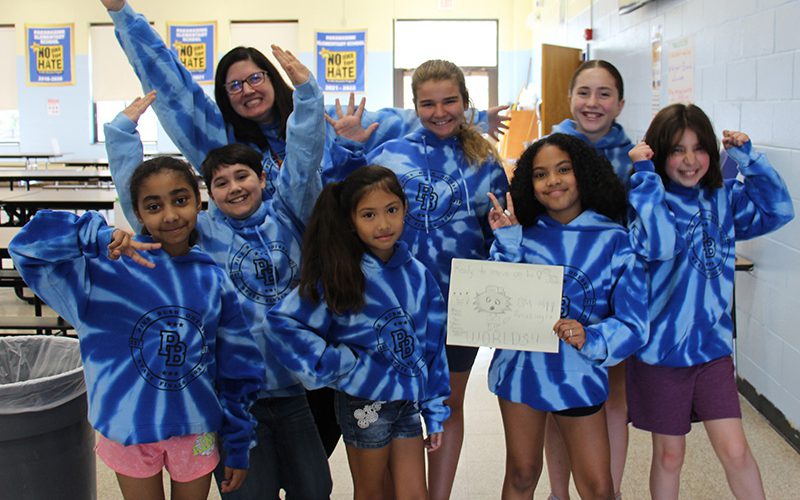 Assistant Principal Colleen crowns the Pakanasink staff member of the month