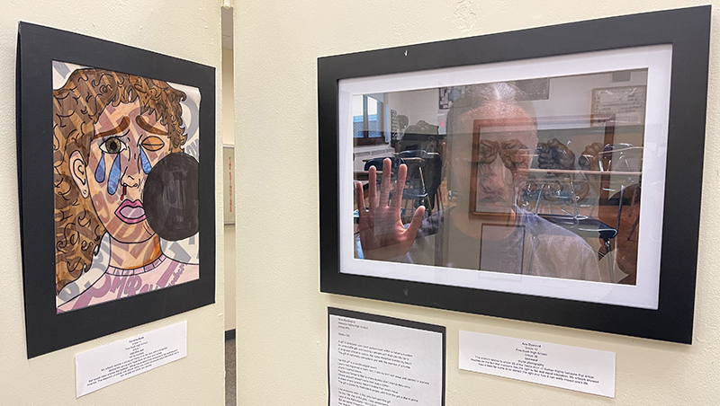 Two pieces of artwork hang next to each other.