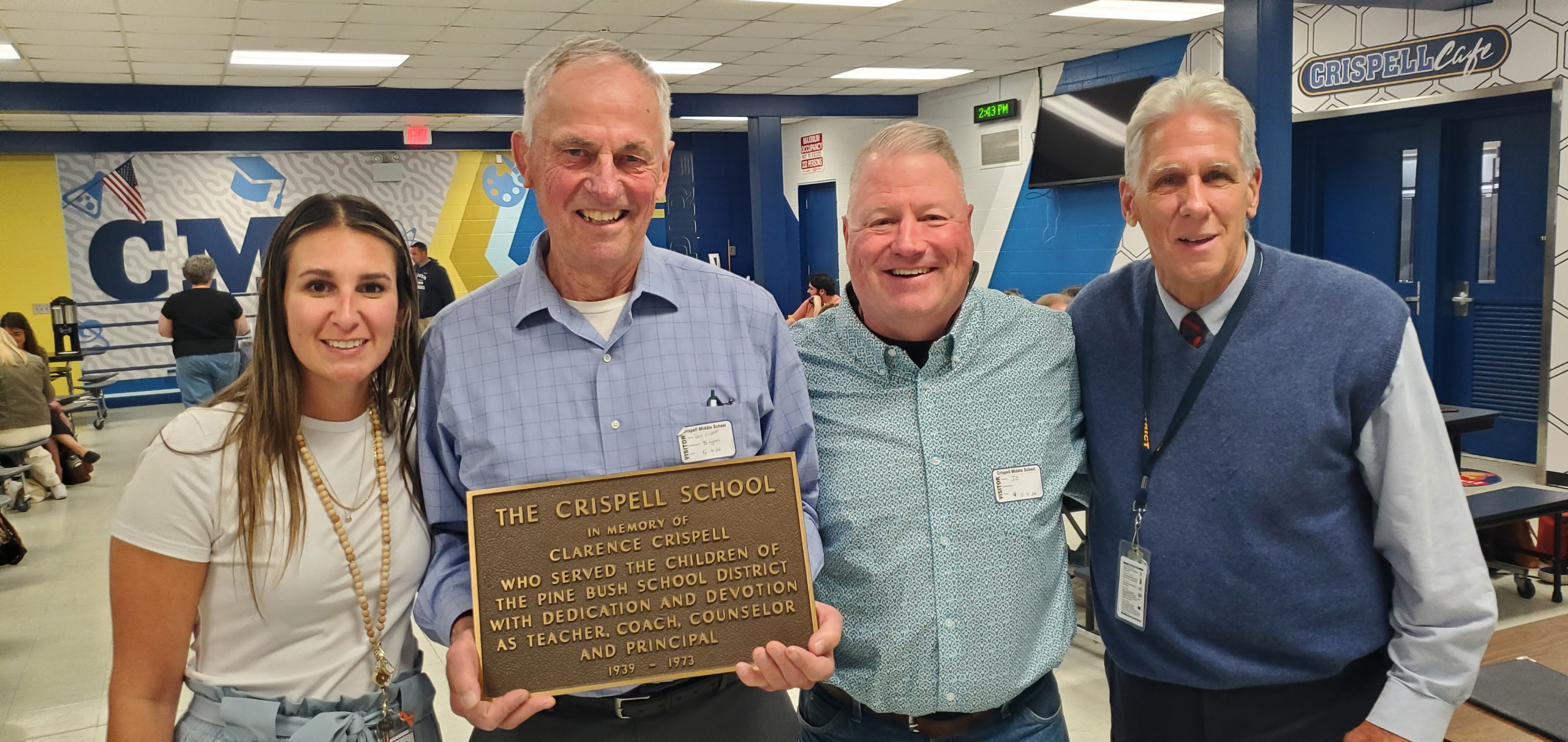 Pictured here are Crispell teacher Kate Blazeski, Don Crispell, retired longtime Crispell principal John Boyle, and Crispell’s interim principal, John Xanthis.