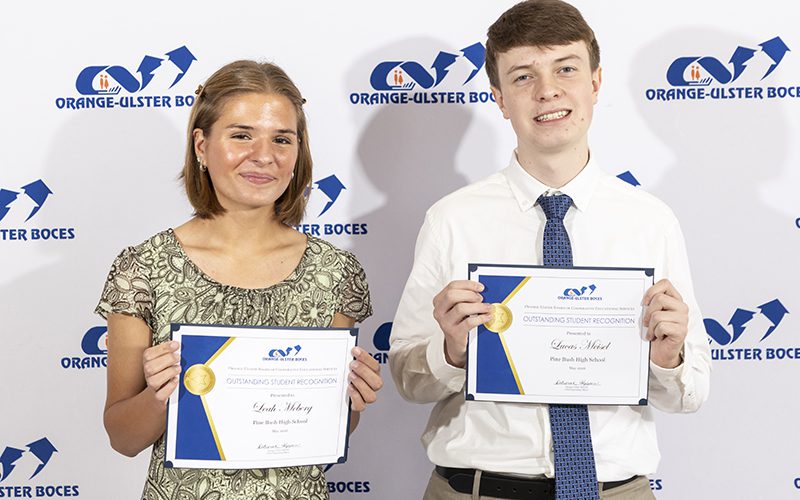 Orange-Ulster BOCES Outstanding Student Honorees luncheon on May 27, 2026. Two high school students dressed nicely hold certificates.