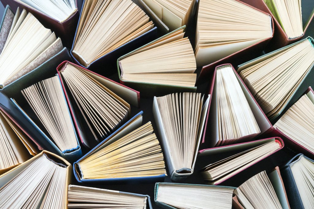 View from above, 10 books fanned out open.