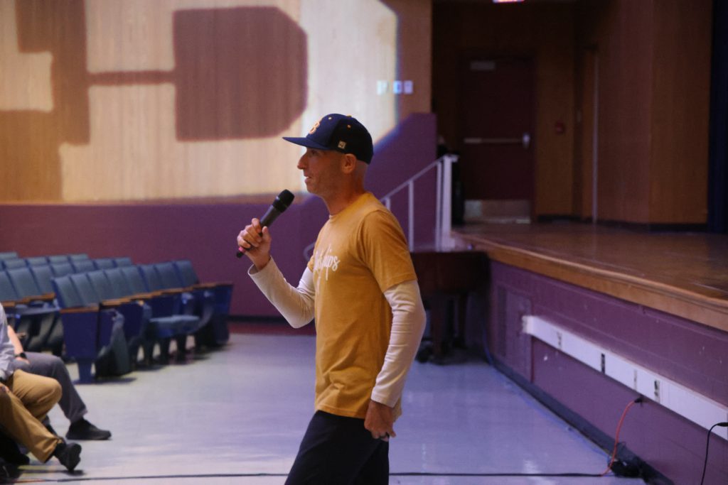 man speaking to an audience