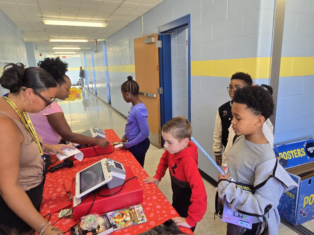 kids waiting in line at book fair