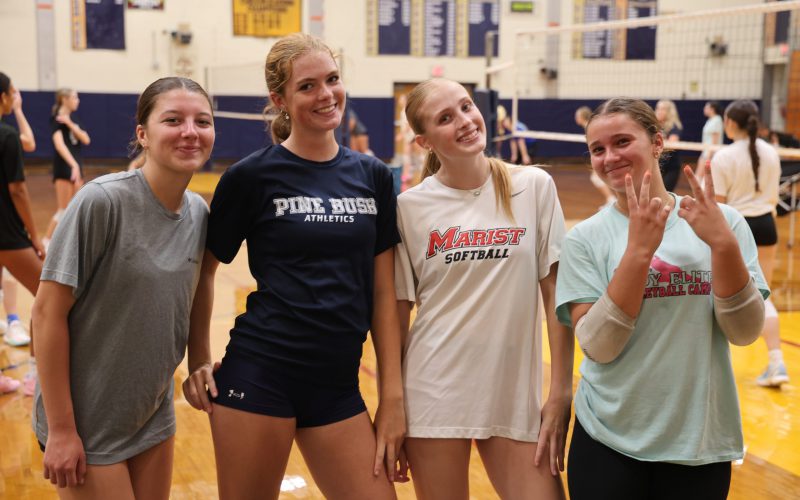 volleyball players standing for picture