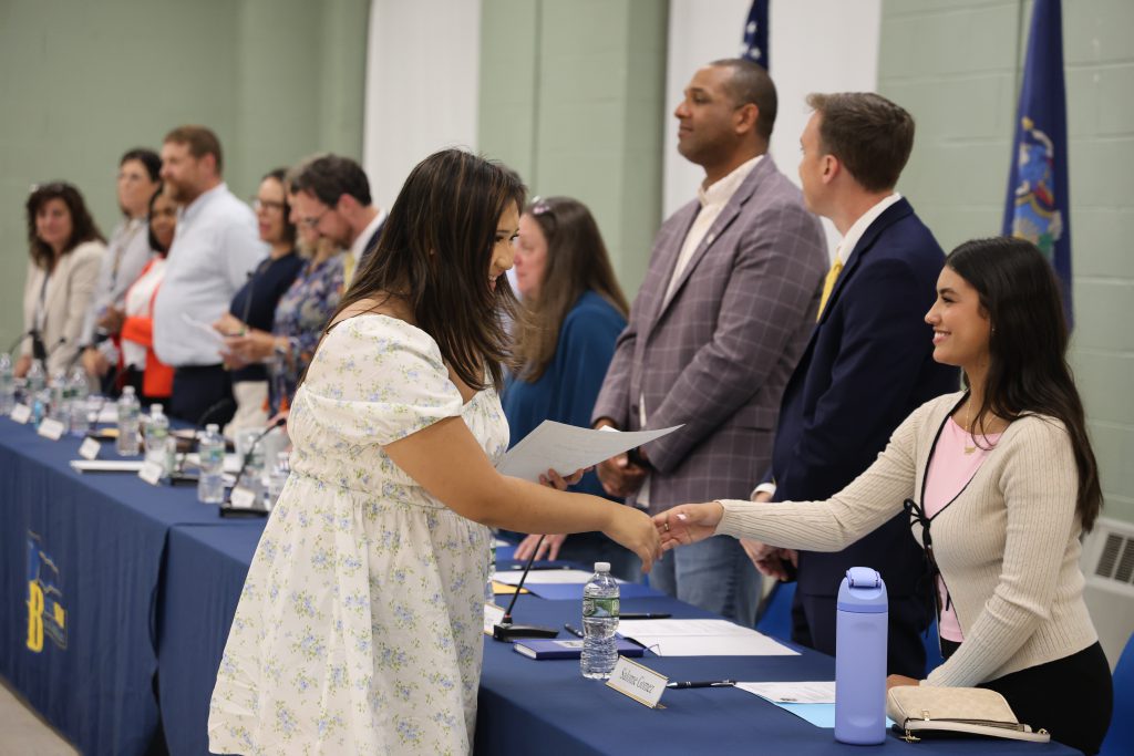 students shaking each others hands