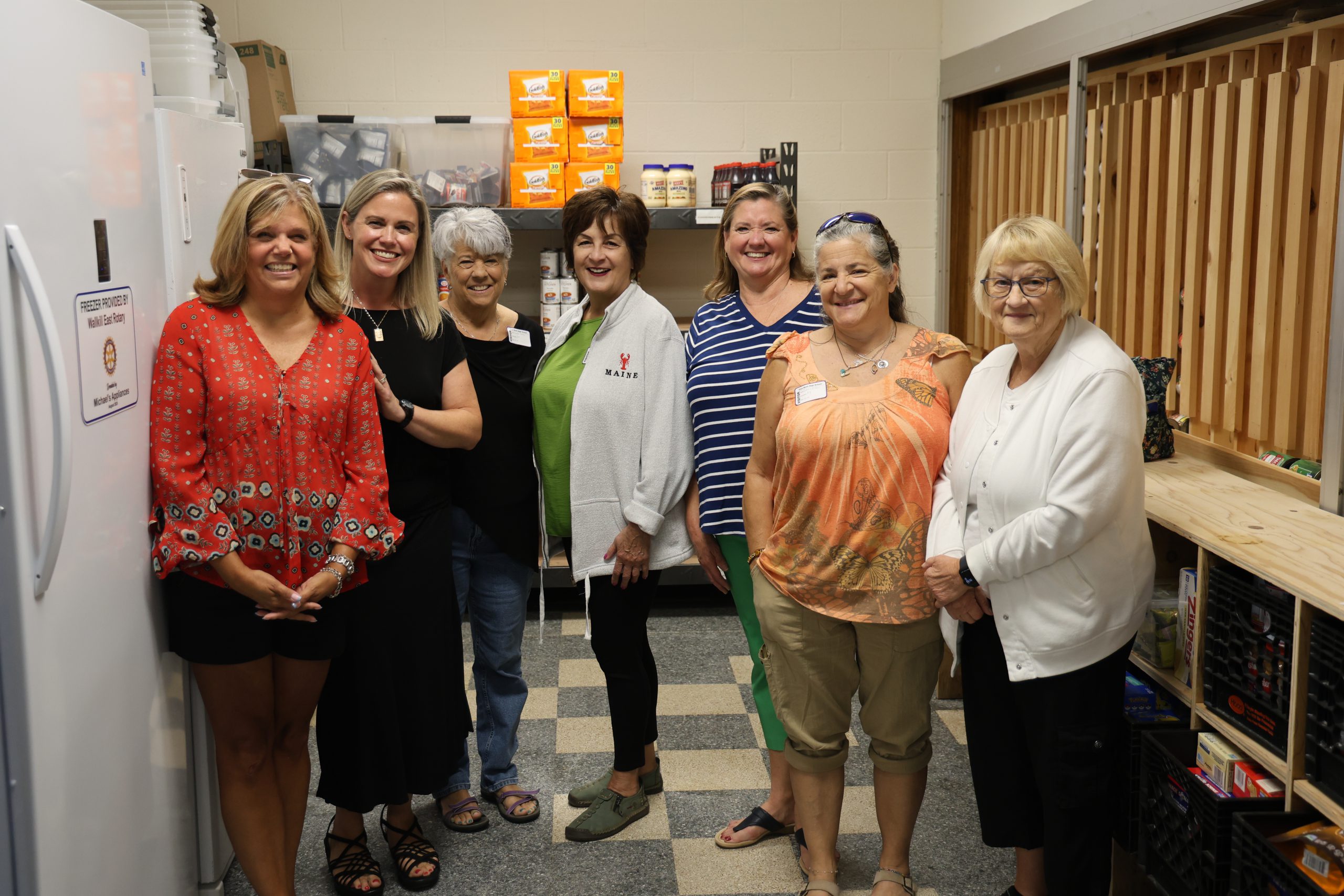 group of woman standing for a picture