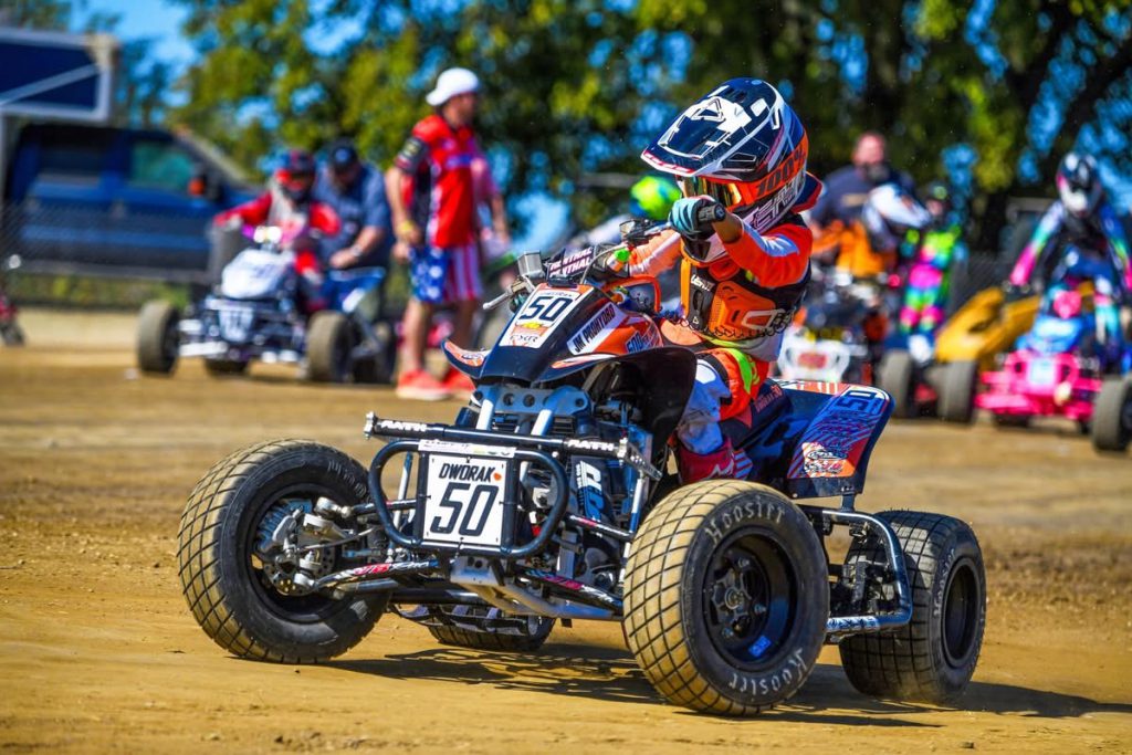 kid riding an atv