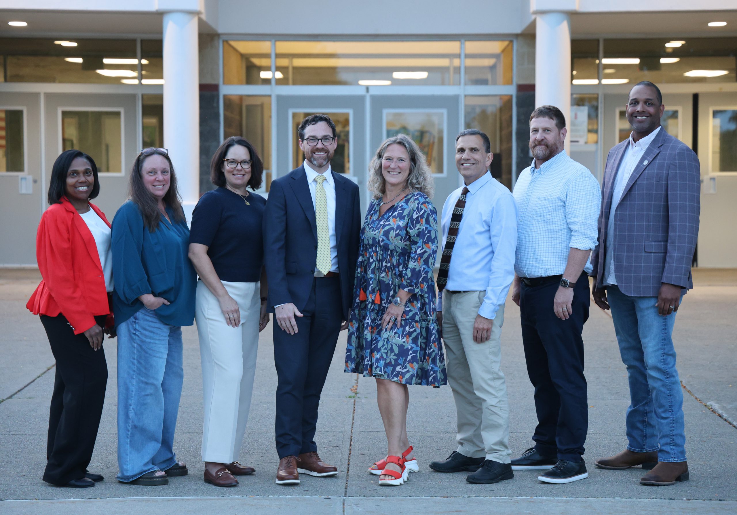 board members and superintendent standing together for picture