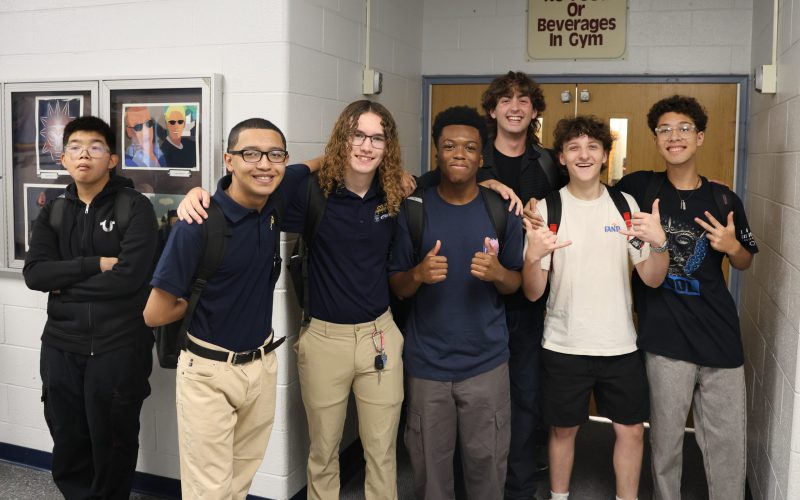 teenagers posing for picture