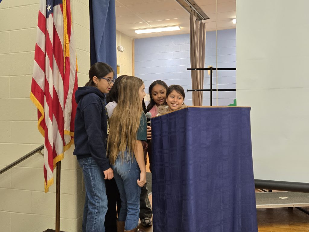 group of kids doing a presentation