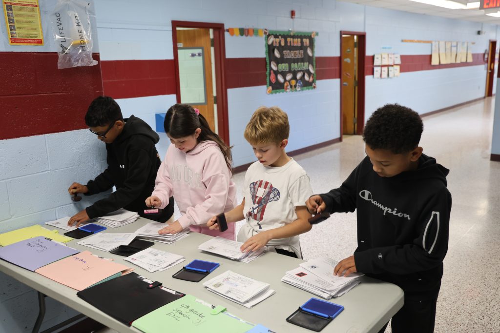 kids sorting letters at school