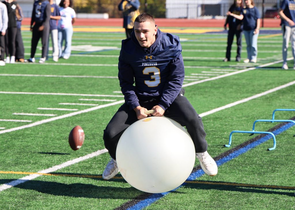 high school student on a bouncing ball