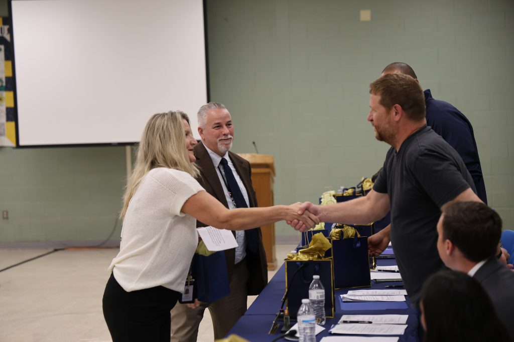 people giving a handshake