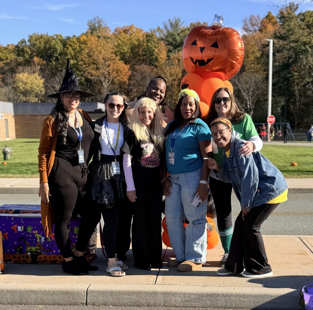 A group of teachers dressed in halloween costumes