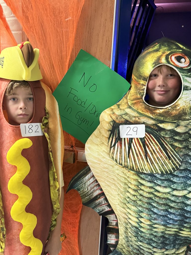 students dressed up in their halloween costumes