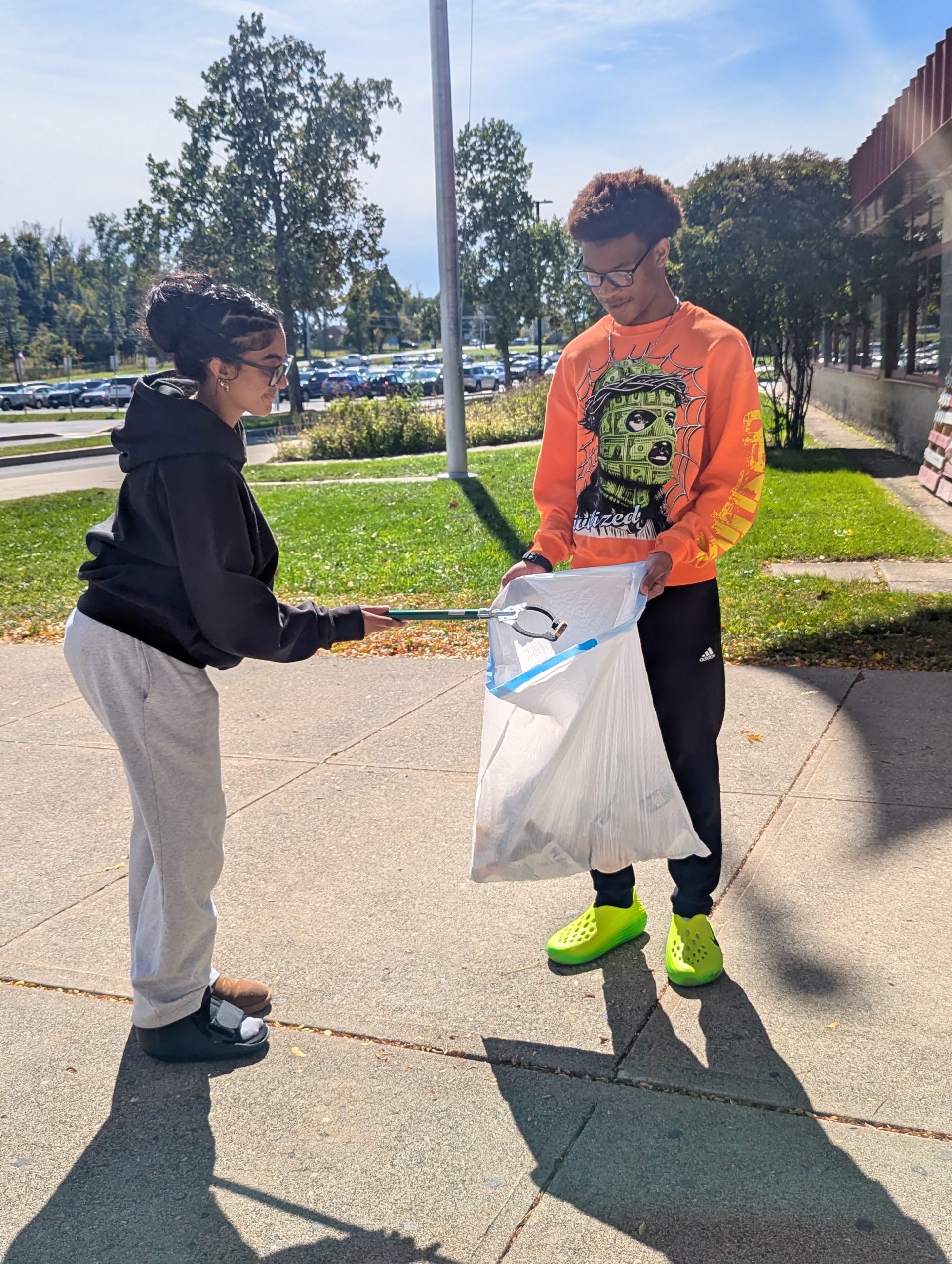 kids picking up garbage